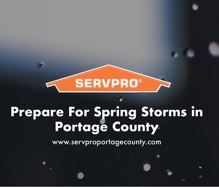 Orange SERVPRO house logo on image with rain drops