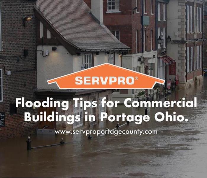 Orange SERVPRO  house logo on flooding and businesses. 